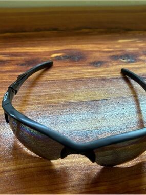 Oakley Black Frame Sunglasses with Iridescent Bronze Lenses